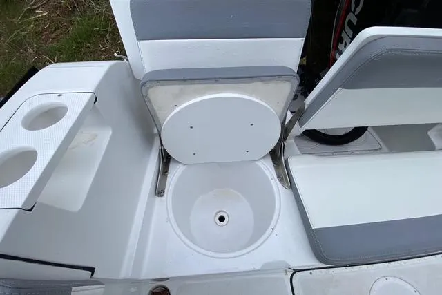 Slide: The Image of Interior of 2021 Release 210 RX boat with seating and cup holders. - 19