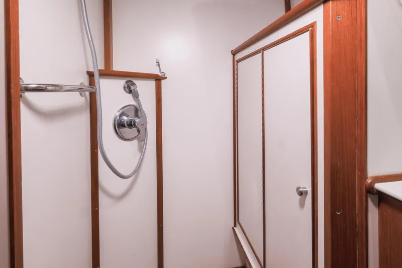 Slide: The Image of Shower area in 2002 Grand Banks 46 Europa yacht with wood accents. - 17