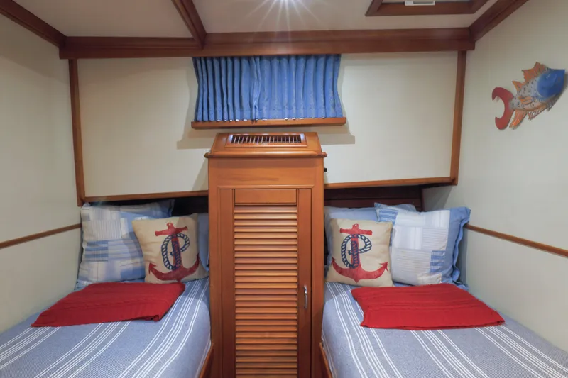 Slide: The Image of Cozy cabin interior of 2002 Grand Banks 46 Europa with nautical-themed decor. - 7