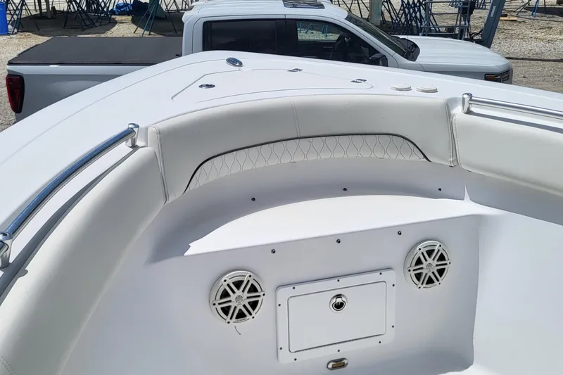 Slide: The Image of 2020 Sportsman Open 282 Center Console boat interior with seating and speakers. - 11