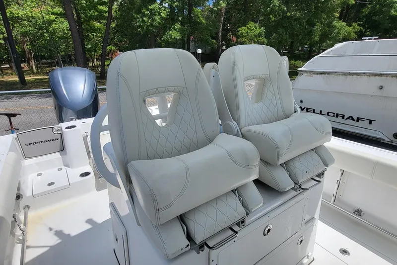 Slide: The Image of 2020 Sportsman Open 282 Center Console boat with luxurious seating and modern design. - 16