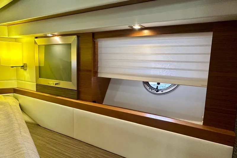 Slide: The Image of Luxurious interior of 2019 Tiara Yachts F44 Flybridge with elegant wood and modern lighting. - 35