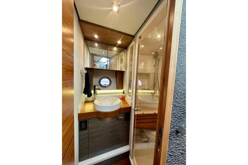 Slide: The Image of Luxurious bathroom in 2019 Tiara Yachts F44 Flybridge with modern fixtures and elegant design. - 37