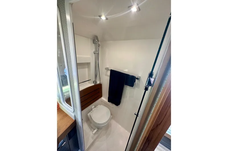 Slide: The Image of Bathroom interior of 2019 Tiara Yachts F44 Flybridge with shower and toilet. - 39