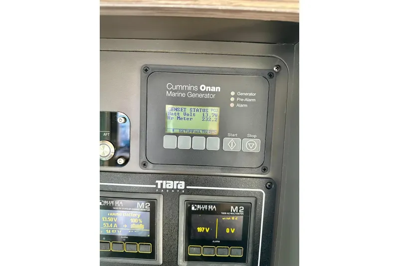 Slide: The Image of Control panel of a 2019 Tiara Yachts F44 Flybridge with Cummins Onan Marine Generator. - 58