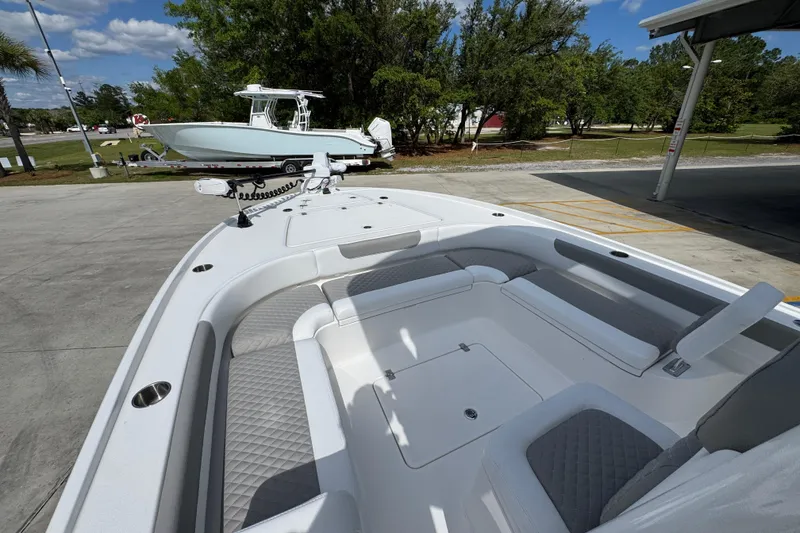 Slide: The Image of 2026 Caymas 26 HB boat interior with spacious seating and modern design. - 18