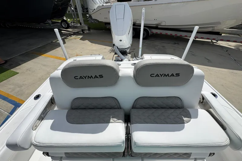 Slide: The Image of 2026 Caymas 26 HB boat seats with logo, featuring sleek design and comfortable cushioning. - 27