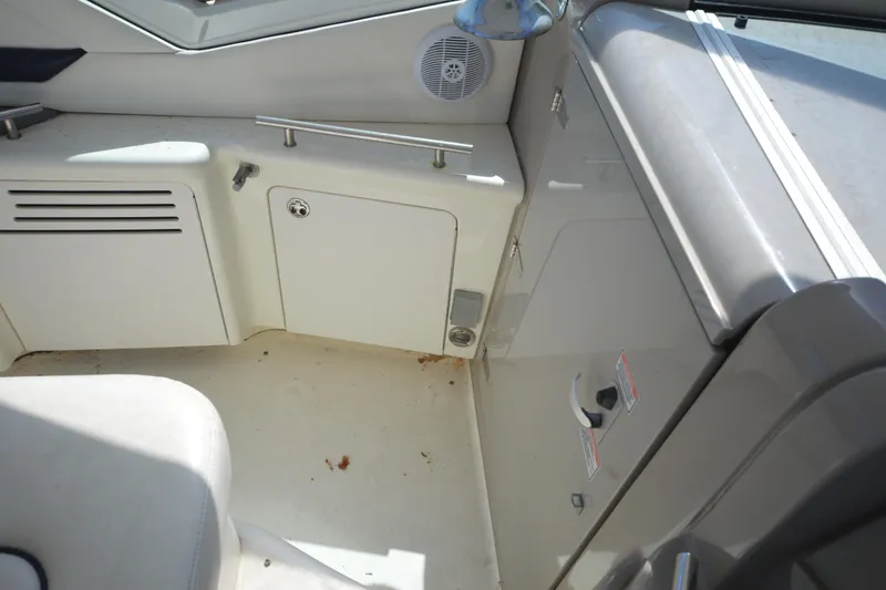 Slide: The Image of Interior view of a 2006 Sea Ray 40 Sundancer boat, featuring storage compartments. - 17