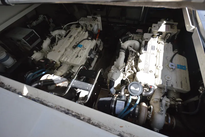 Slide: The Image of Engine compartment of a 2006 Sea Ray 40 Sundancer boat, showcasing dual engines. - 30