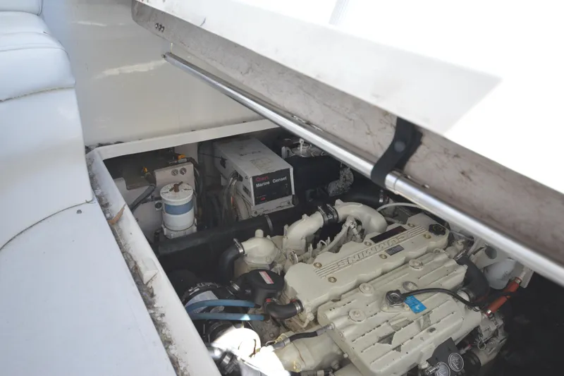 Slide: The Image of Engine compartment of a 2006 Sea Ray 40 Sundancer boat, showcasing marine equipment. - 34