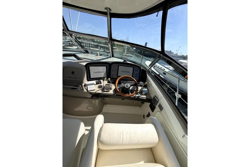 Slide: The Image of Interior cockpit of 2006 Sea Ray 40 Sundancer with Garmin navigation system. - 48