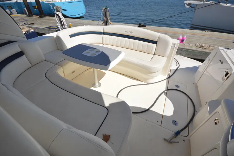 Slide: The Image of 2006 Sea Ray 40 Sundancer yacht with spacious seating and table on deck. - 8