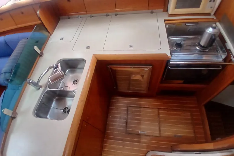 Slide: The Image of Interior of 2002 Jeanneau Sun Odyssey 43 DS yacht kitchen with sink and stove. - 20