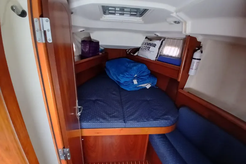 Slide: The Image of Cozy cabin interior of 2002 Jeanneau Sun Odyssey 43 DS sailboat. - 25