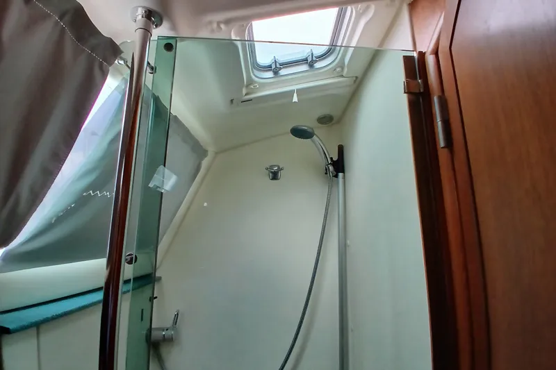 Slide: The Image of Shower area in 2002 Jeanneau Sun Odyssey 43 DS sailboat with glass door and skylight. - 37