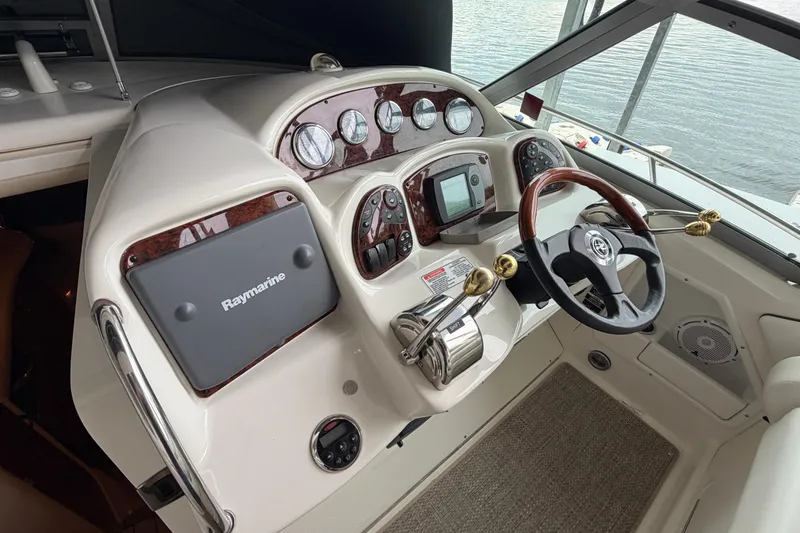 Slide: The Image of Cockpit of 2007 Sea Ray Sundancer 320 with Raymarine navigation system. - 10