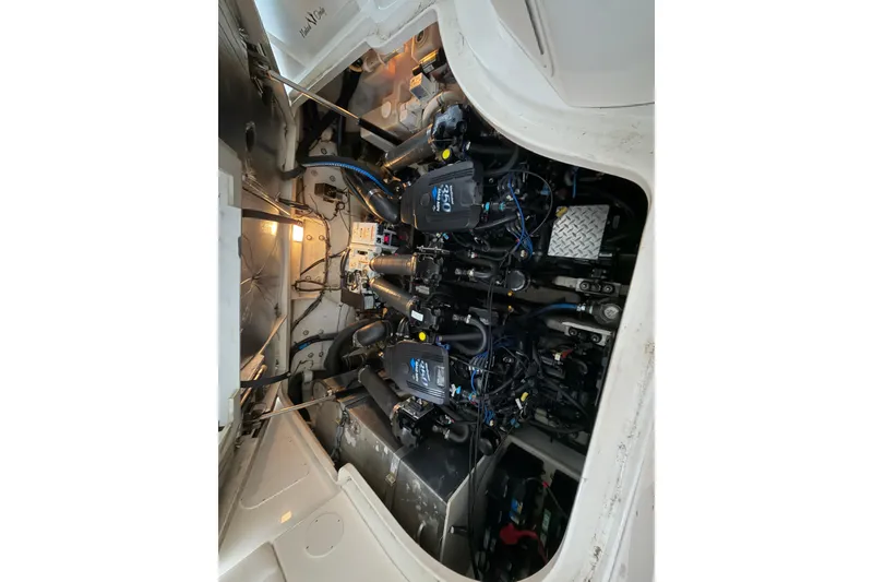 Slide: The Image of Engine compartment of a 2007 Sea Ray Sundancer 320 boat, showcasing dual engines. - 31