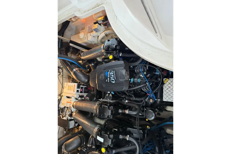 Slide: The Image of Engine compartment of a 2007 Sea Ray Sundancer 320 boat, featuring a MerCruiser 350 engine. - 32