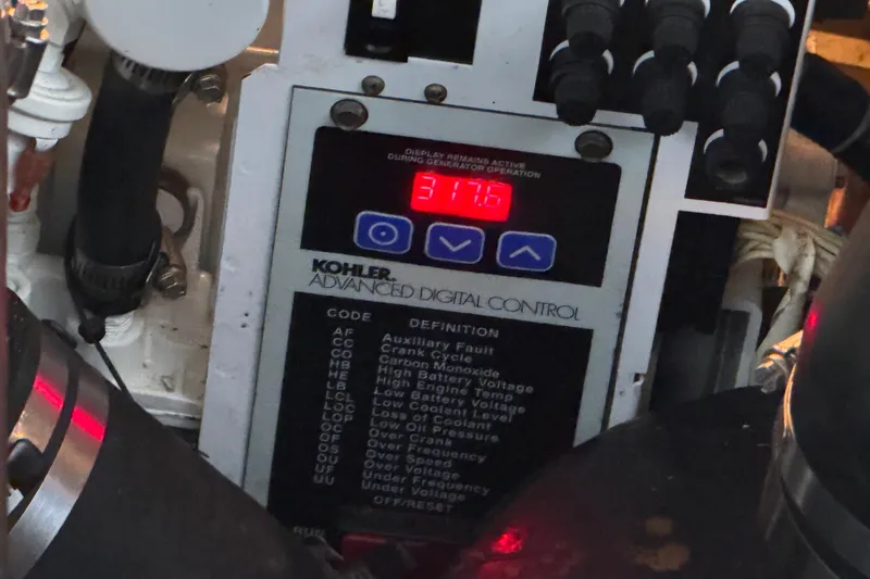 Slide: The Image of Kohler digital control panel on 2007 Sea Ray Sundancer 320, displaying 31.6. - 35
