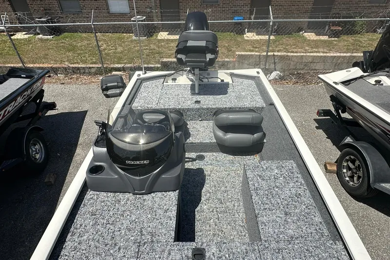 Slide: The Image of 2026 Tracker Pro Team 170 TX fishing boat with spacious deck and seating. - 10