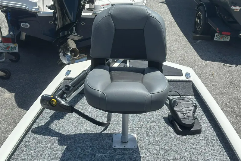 Slide: The Image of Fishing boat seat on 2026 Tracker Pro Team 170 TX with trolling motor. - 6