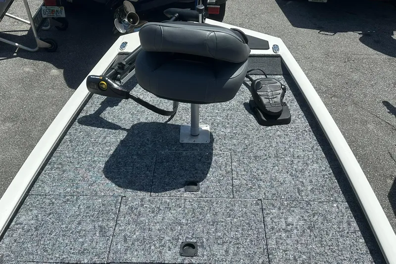 Slide: The Image of 2026 Tracker Pro Team 170 TX boat deck with seat and trolling motor. - 7