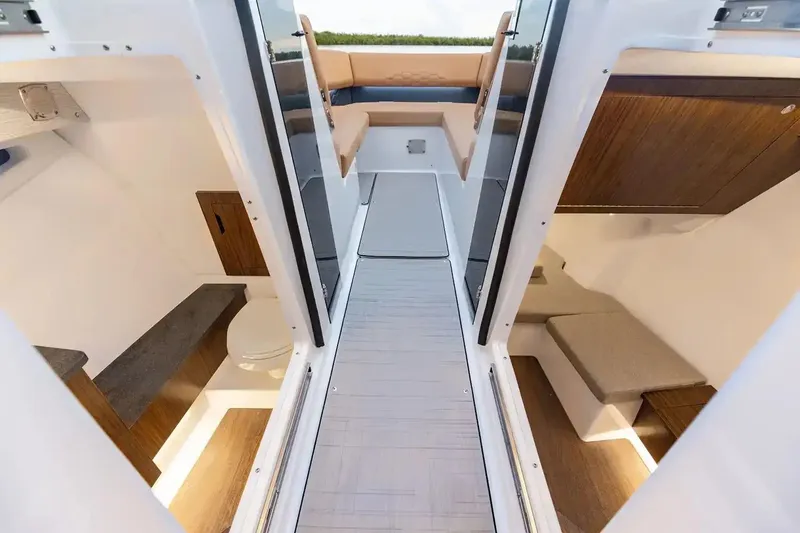 Slide: The Image of Manufacturer Provided Image: Interior view of 2026 Four Winns H33 OB boat, featuring modern design and comfortable seating. - 5