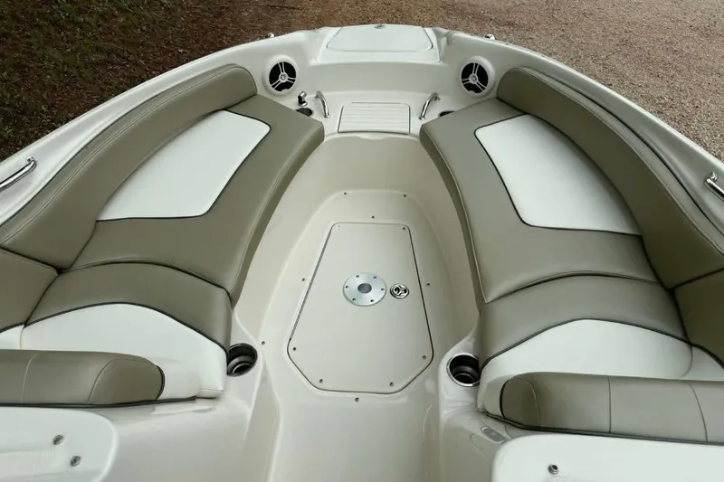 Slide: The Image of Interior view of 2006 Sea Ray 240 Sundeck boat with cushioned seating. - 1
