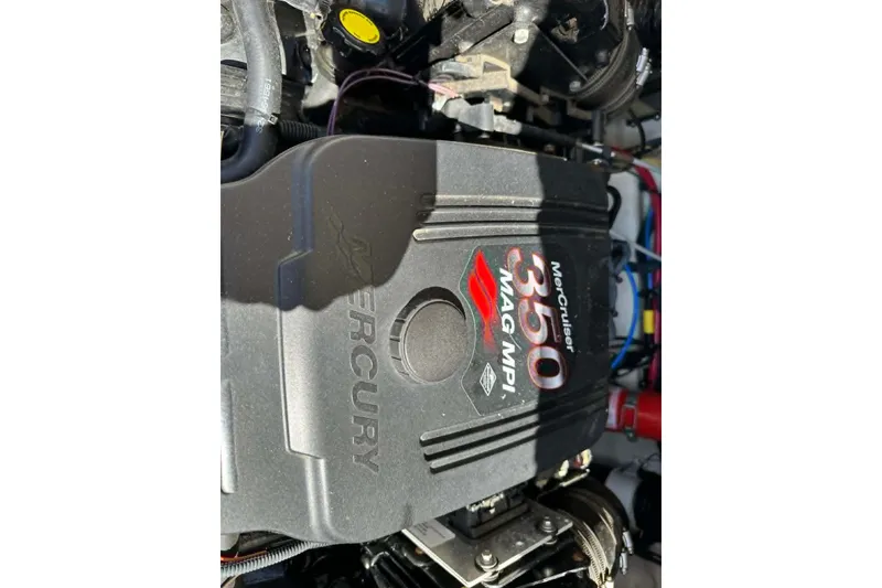 Slide: The Image of MerCruiser 350 MAG MPI engine in a 2006 Sea Ray 240 Sundeck boat. - 8