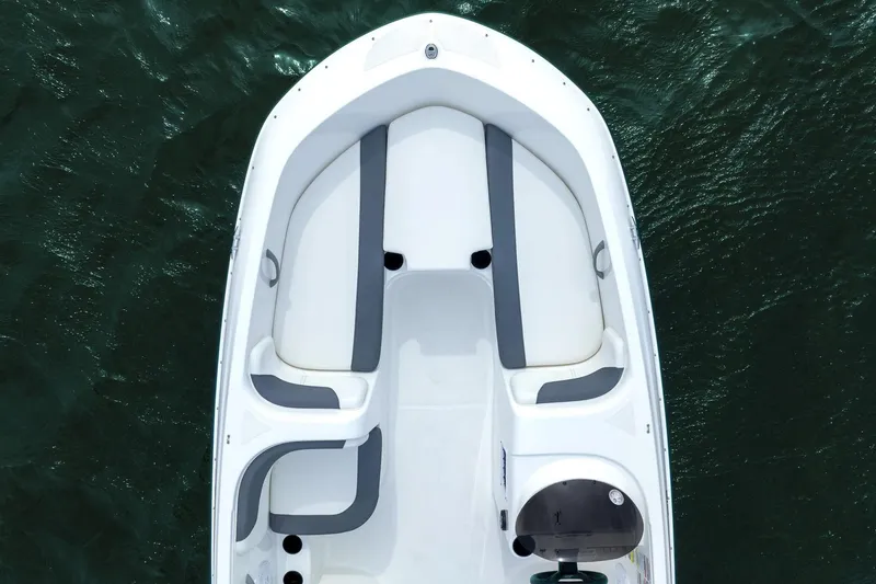 Slide: The Image of Manufacturer Provided Image: 2025 Bayliner Element E18 boat, aerial view, white and gray seating, on water. - 5