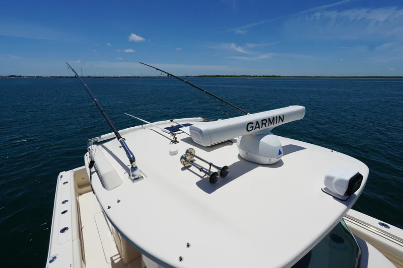 Slide: The Image of Grady-White Canyon 376 boat with Garmin equipment on open water, 2020 model. - 14