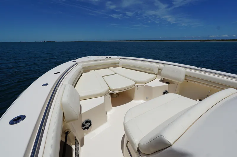 Slide: The Image of 2020 Grady-White Canyon 376 boat interior with luxurious seating on open water. - 4