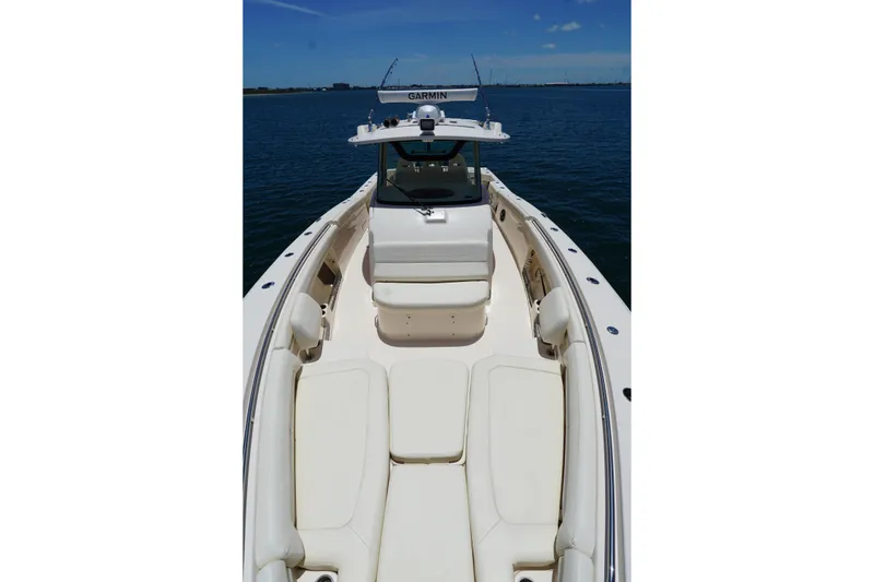 Slide: The Image of 2020 Grady-White Canyon 376 boat with spacious seating on calm water. - 6