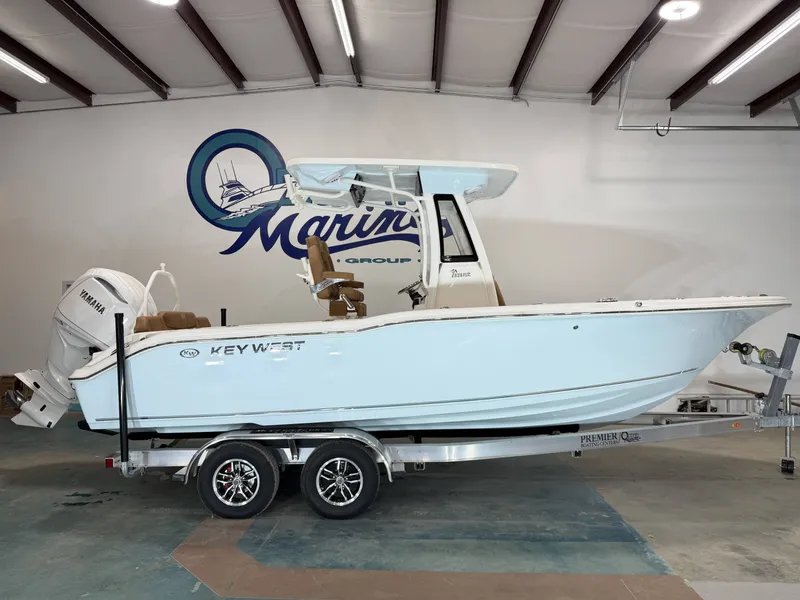 The Image of 2026 Key West 239 FSR boat in a showroom. - 1