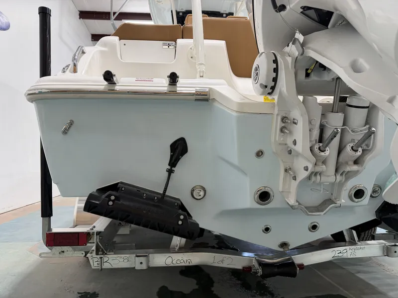 Slide: The Image of Rear view of a 2026 Key West 239 FSR boat on a trailer. - 10