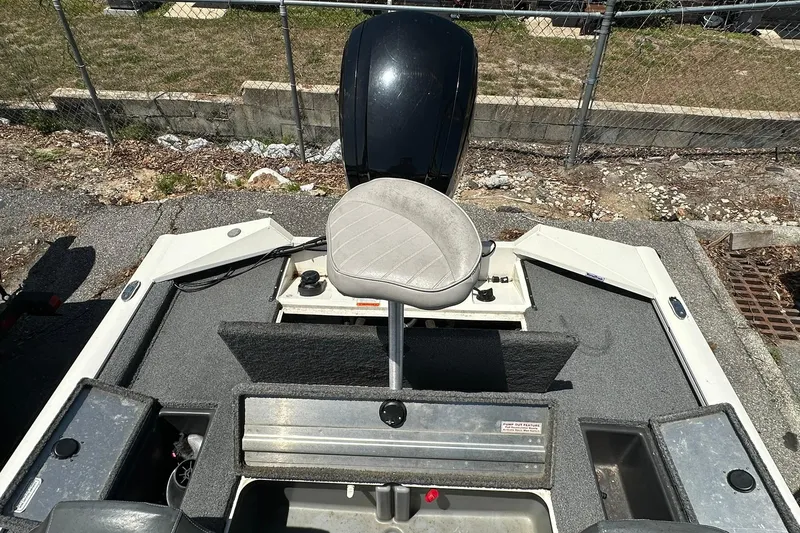 Slide: The Image of 2019 Tracker Pro Team 175 TXW Tournament Edition boat interior with seating and storage compartments. - 15