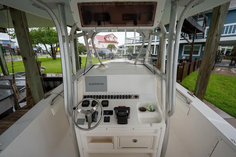 Slide: The Image of 2007 Sea Hunt Triton 290 boat cockpit with Garmin navigation system. - 21