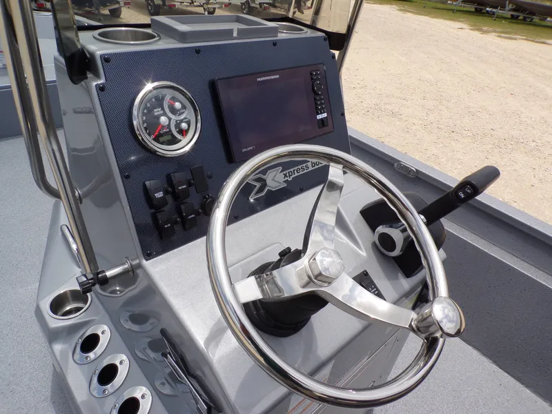 Slide: The Image of Steering console of Xpress SW22B boat, model year 2026. - 23
