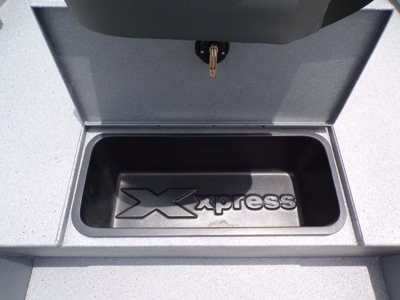 Slide: The Image of Xpress SW22B 2026 boat storage compartment with logo. - 27