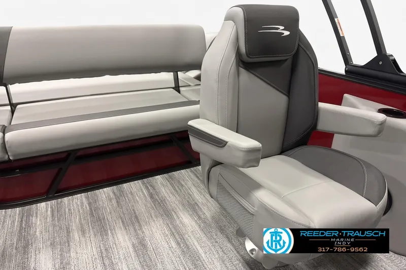 Slide: The Image of 2026 Bennington 21 SSB boat interior with gray seating and armrests. - 3