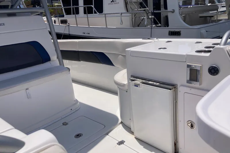 Slide: The Image of 2011 Donzi 38 ZFX Open boat interior with seating and storage compartments. - 40