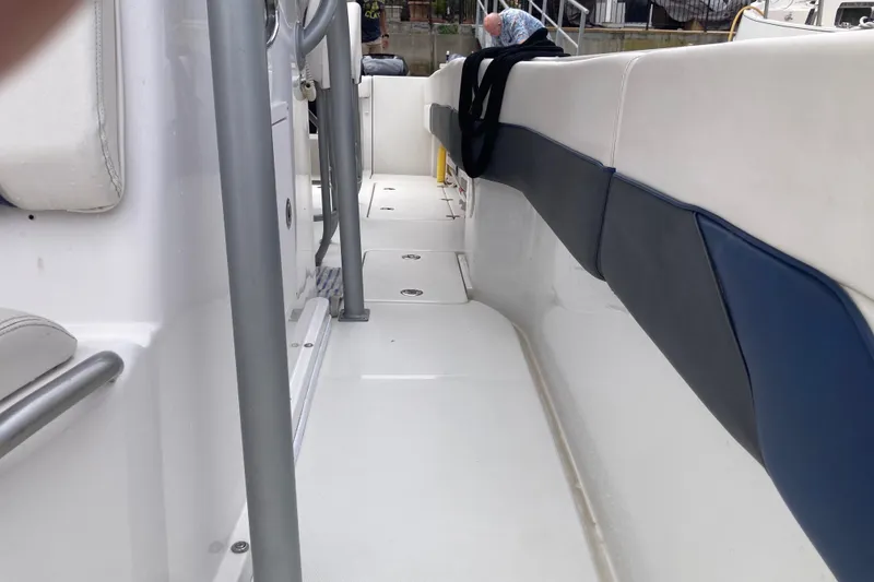 Slide: The Image of 2011 Donzi 38 ZFX Open boat interior with white and blue seating. - 42