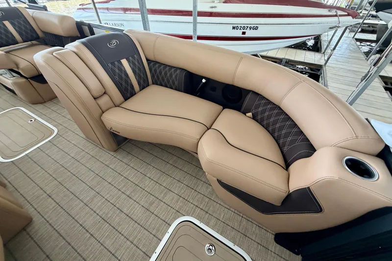 Slide: The Image of Luxurious seating on 2023 Barletta Lusso 23U pontoon boat, featuring elegant tan upholstery. - 12