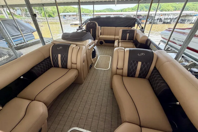 Slide: The Image of 2023 Barletta Lusso 23U pontoon boat interior with luxurious tan seating. - 14