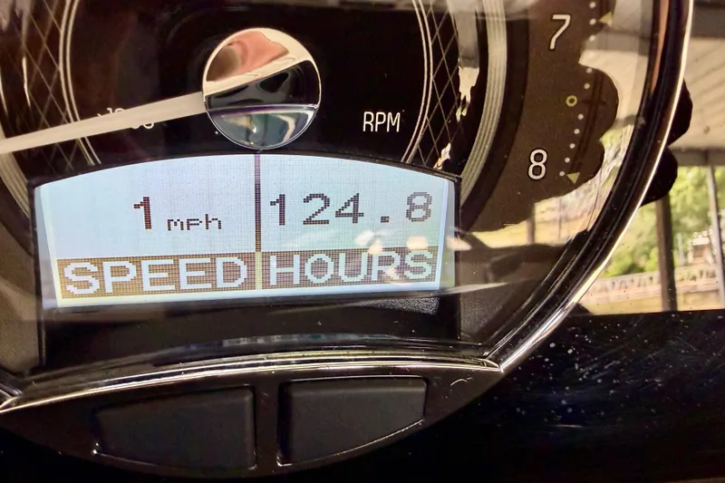 Slide: The Image of Close-up of 2023 Barletta Lusso 23U speedometer showing 1 mph and 124.8 hours. - 19