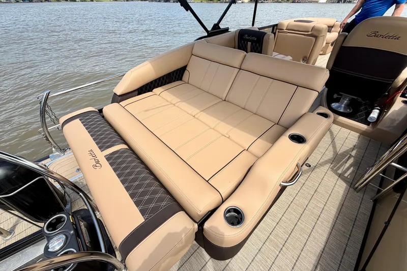 Slide: The Image of Luxurious seating on 2023 Barletta Lusso 23U pontoon boat, featuring elegant tan upholstery. - 34