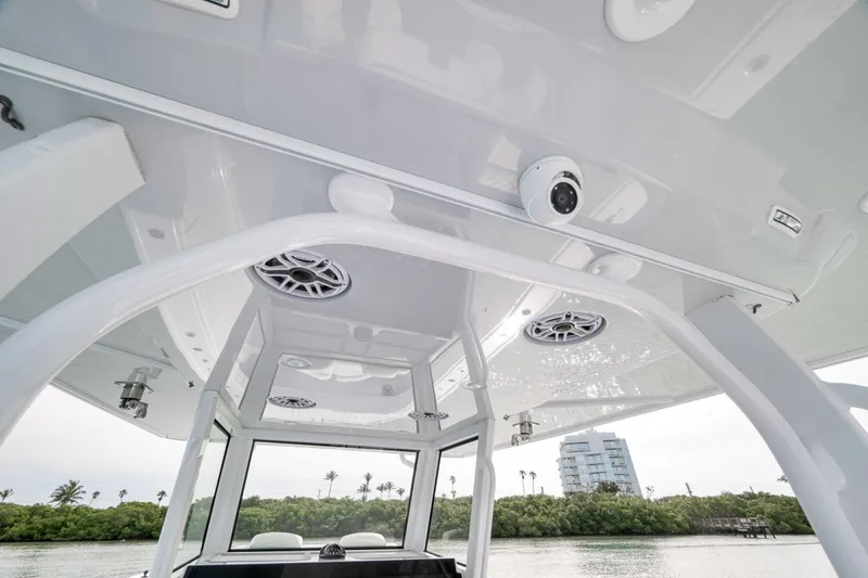 Slide: The Image of 2024 Costa Custom Boats 34SV interior view with speakers and camera. - 33