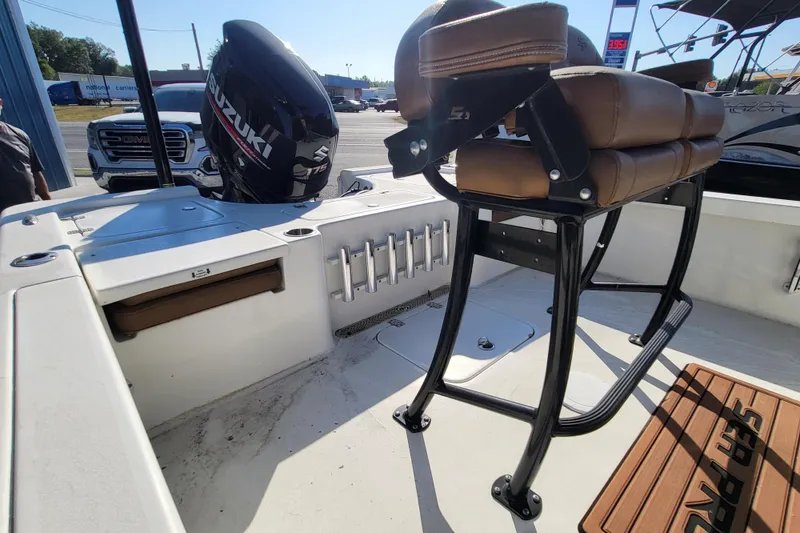 Slide: The Image of 2019 Sea Pro 208 Bay boat interior with Suzuki 175 engine and seating. - 6