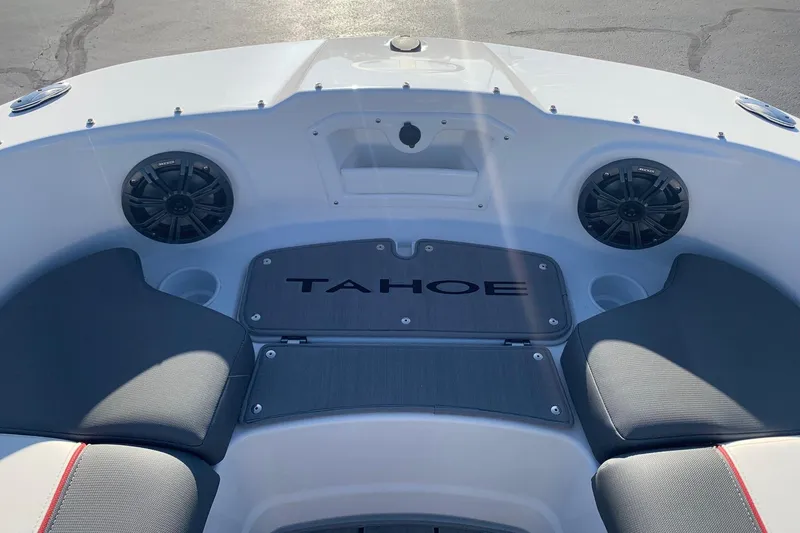 Slide: The Image of 2023 Tahoe T21 boat interior with speakers and seating area. - 4