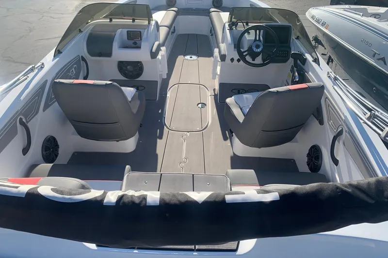 Slide: The Image of Interior of 2023 Tahoe T21 boat with modern seating and steering console. - 6